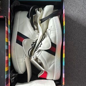 White Sneakers with Red and Black Stripes